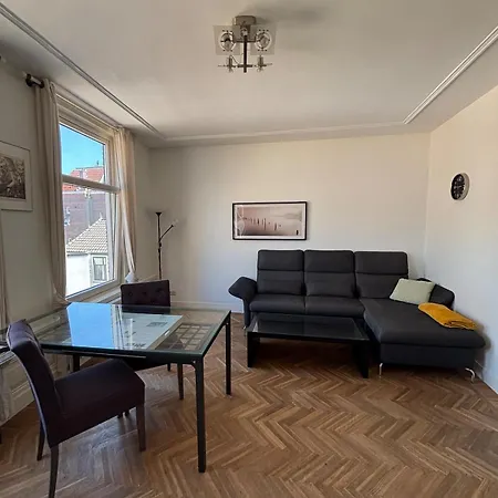 By The Appartement *